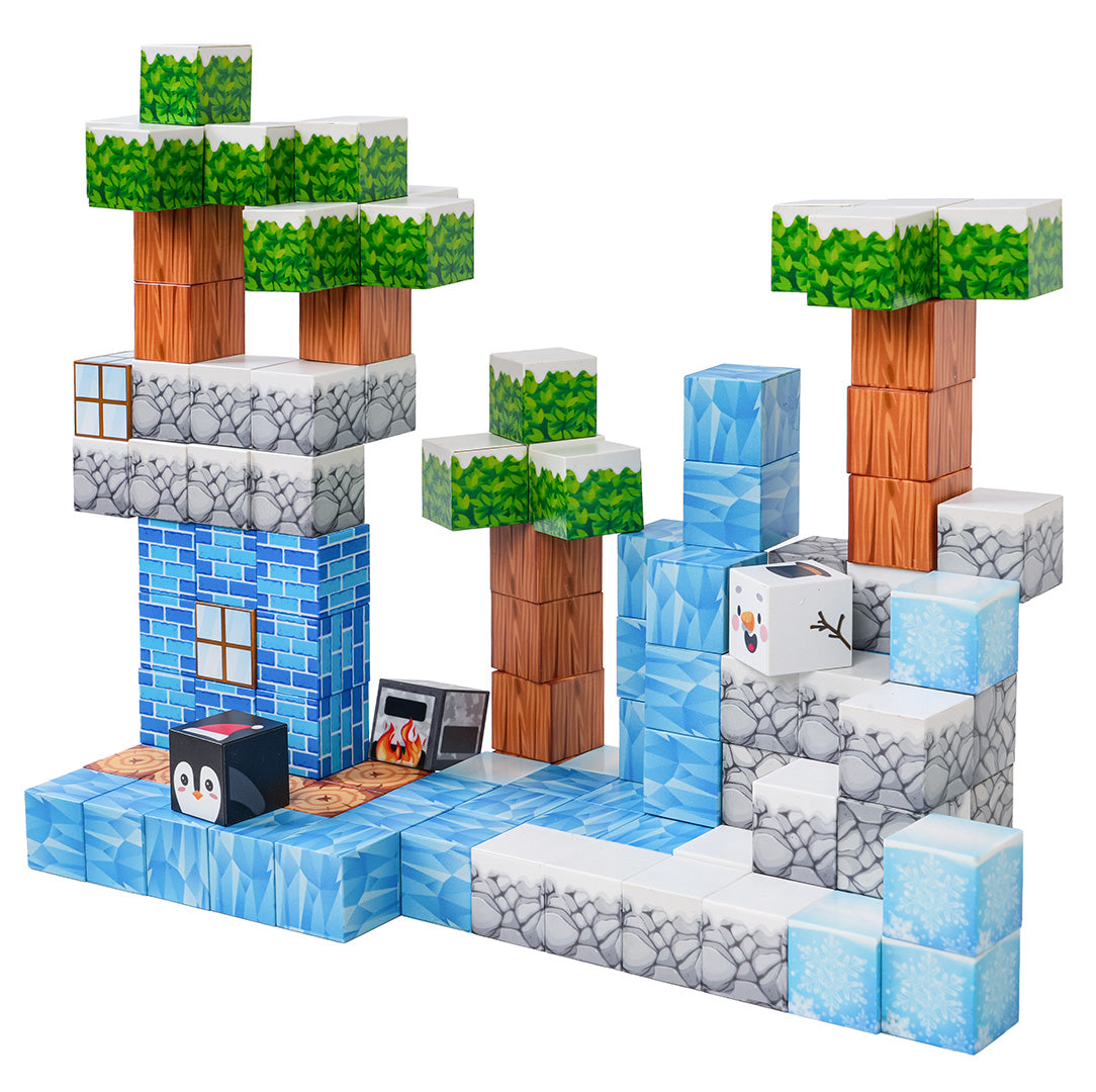 Magnētisko pikseļu kluču komplekts ar ziemas ainavu — redzami koki, ledus bloki, krāsns, pingvīns un sniegavīrs