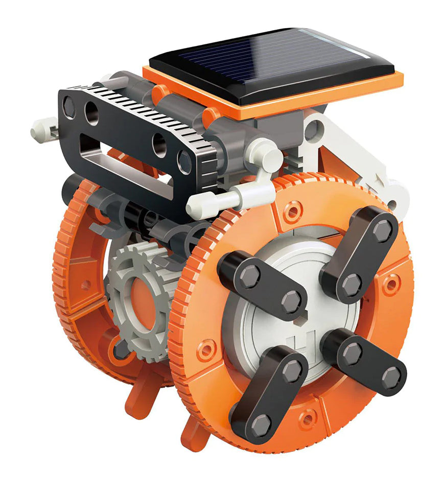 7 vienā saules robots ar diviem lieliem riteņiem oranžā un melnā krāsā