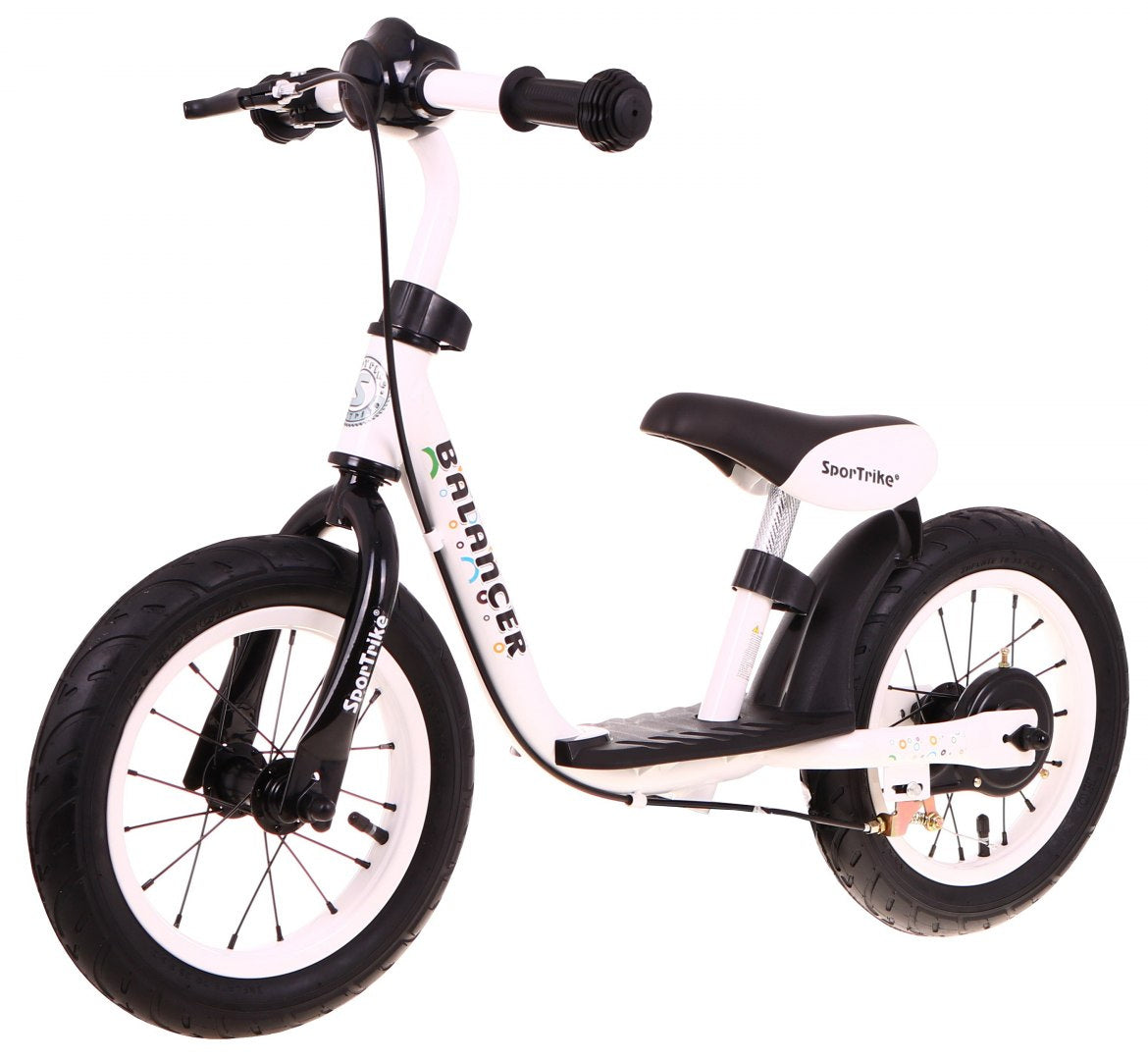 Balti melns SportTrike bērnu balansa ritenis ar piepūšamām riepām, skats no priekšpuses sāna