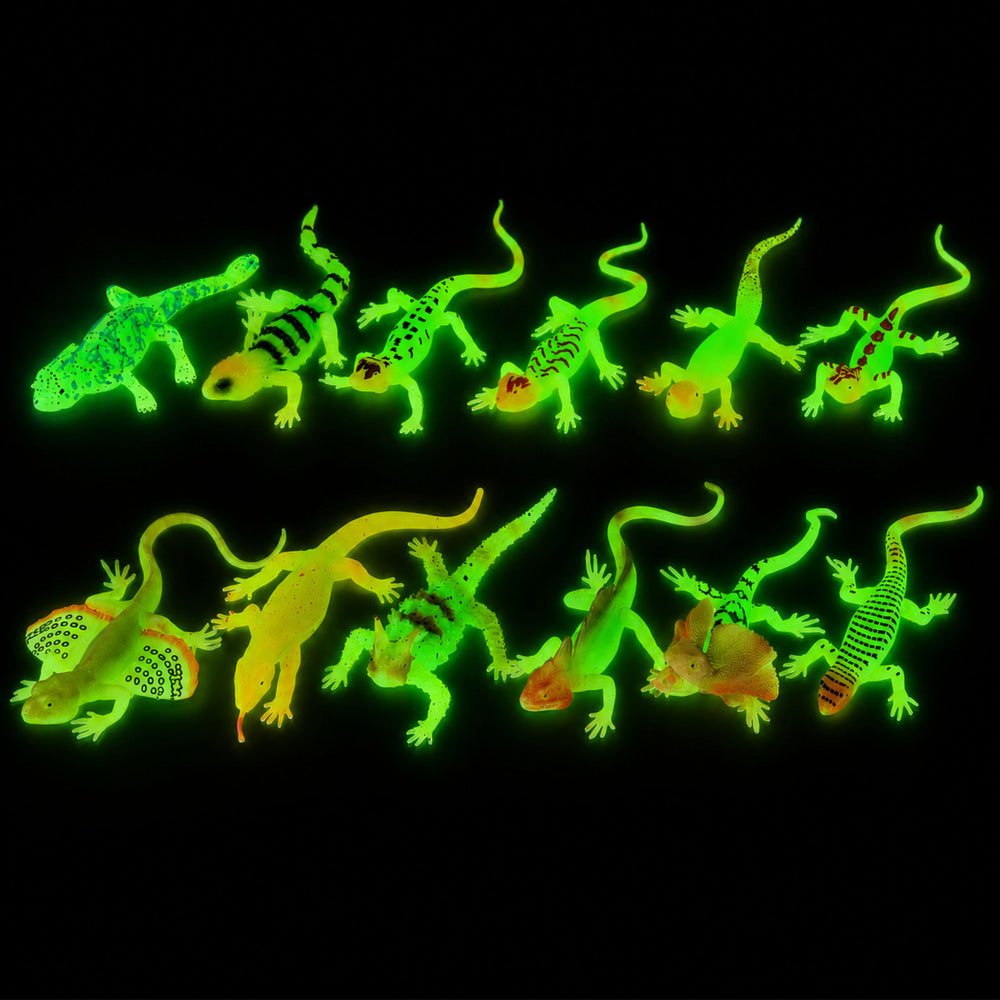 Dažādas zaļas fluorescējošas gumijas ķirzakas, kas spīd tumsā