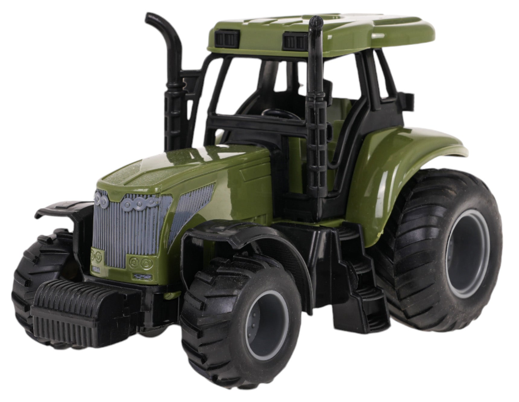 Zaļš rotaļu traktors — tuvplāns ar lieliem protektora riteņiem.