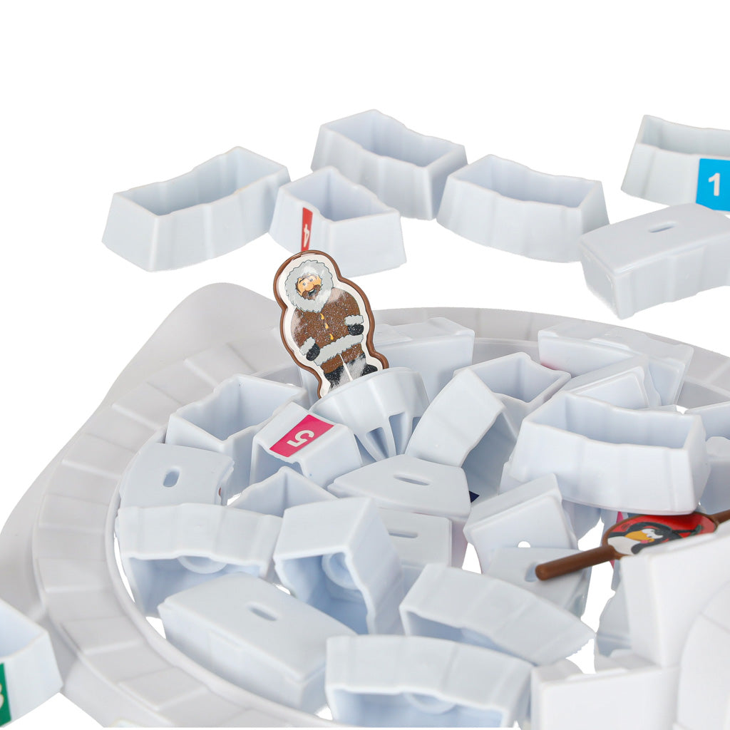 Igloo spēle pēc ledus bloku sabrukšanas ar eskimosa figūru