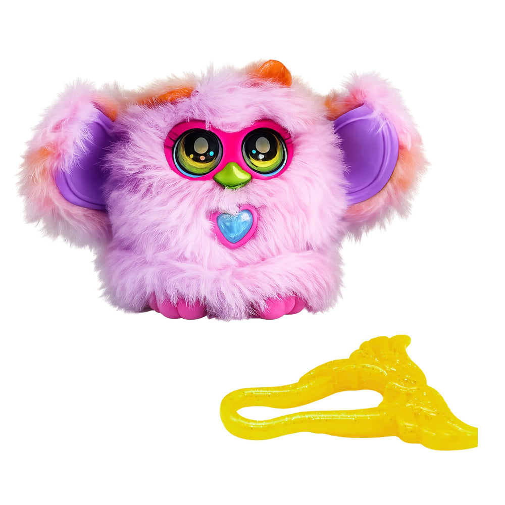 Interaktīvs pūkains L-Toys Genie Pets briesmonītis violetā un rozā krāsā ar lielām acīm, kustīgām ausīm un sirsniņas formas pogu, komplektā ar dzeltenu burvju aksesuāru