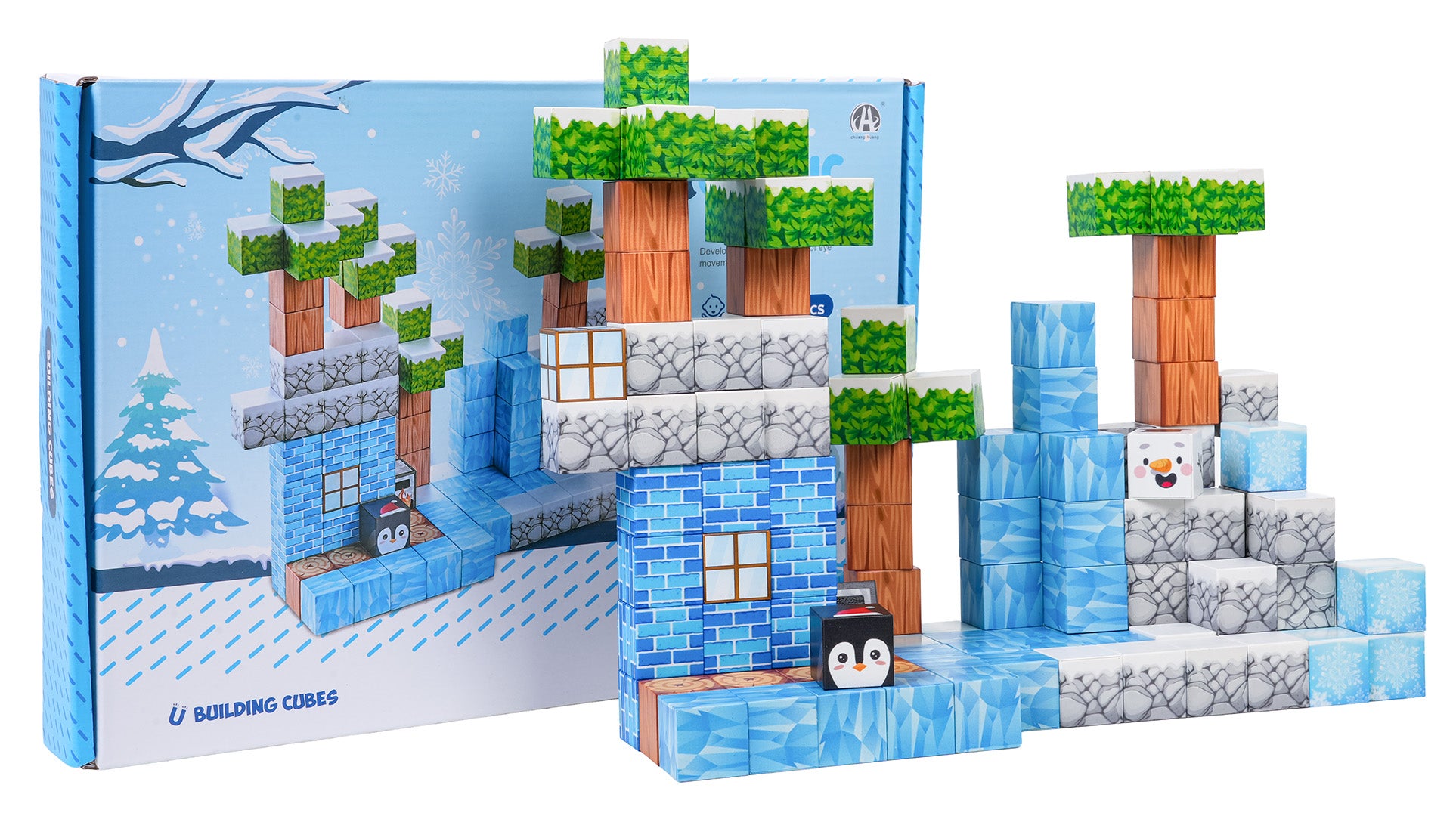 Magnētisko pikseļu kluču konstrukcija ar ziemas motīvu, redzami koki, ledus bloki, sniegavīrs un pingvīns