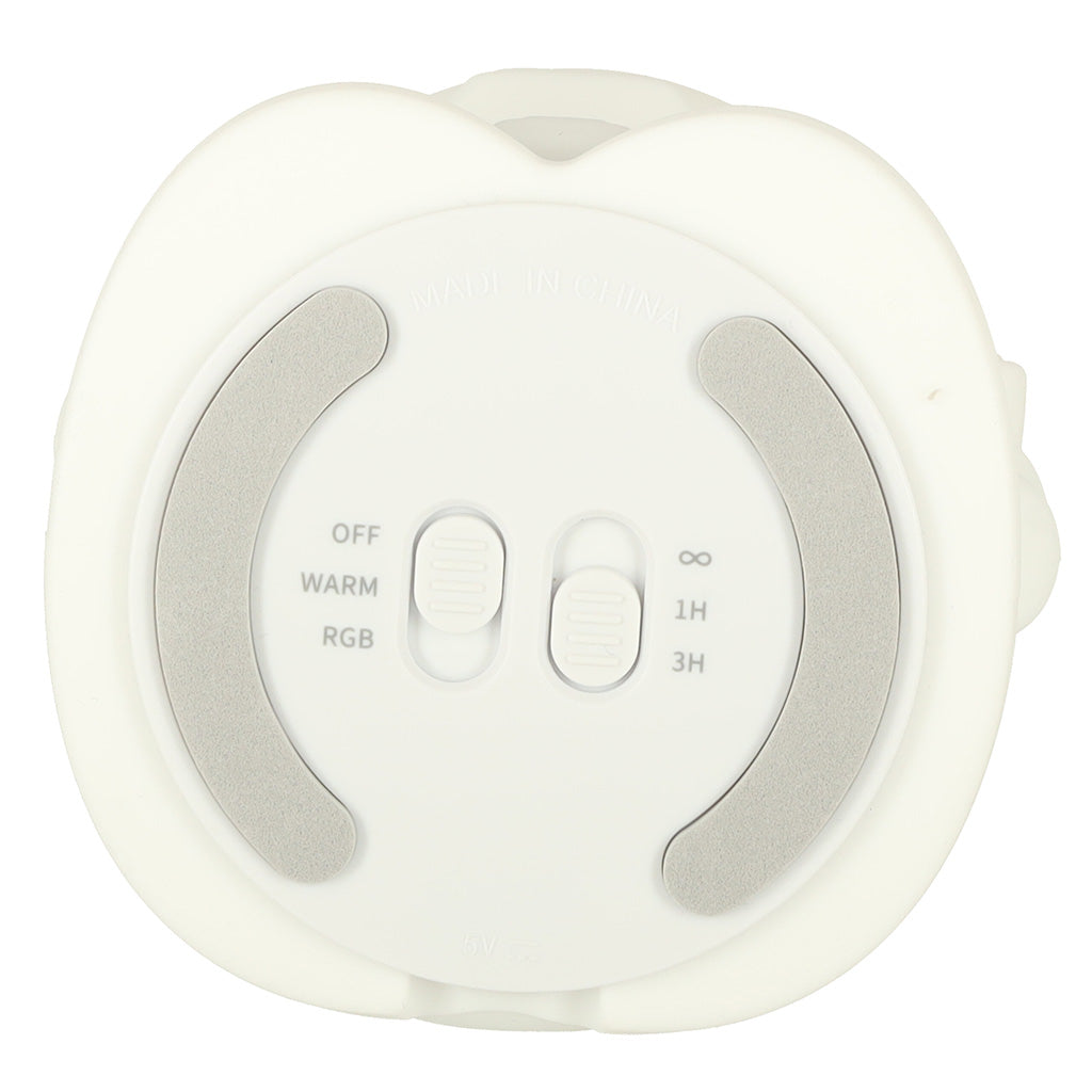 Astronauta naktslampiņas apakšdaļa ar gaismas un taimera slēdžiem