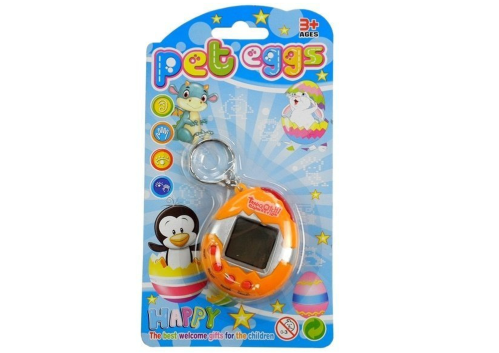 Oranžs elektroniskais tamagotchi olas formā blistera iepakojumā ar atslēgu piekariņu