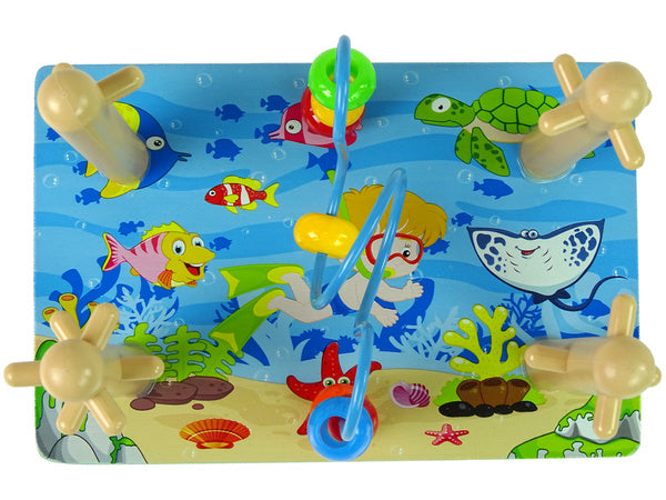 Formu šķirotājs “Jūras pasaule” ar krāsainiem klucīšiem un pērlīšu labirintu (36m+)