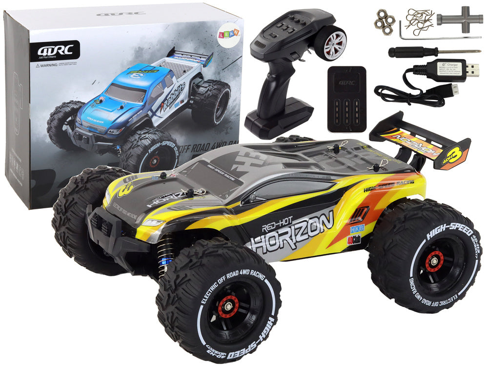 Rabbits RC bezceļu auto 4WD dzeltenā krāsā ar lielām riepām un 2.4GHz pulti
