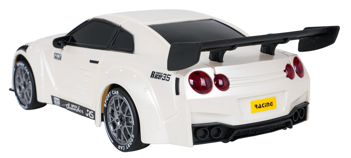 RC drifta auto 4WD pērļu balts ar lielu melnu spoileri — aizmugures sānu skats