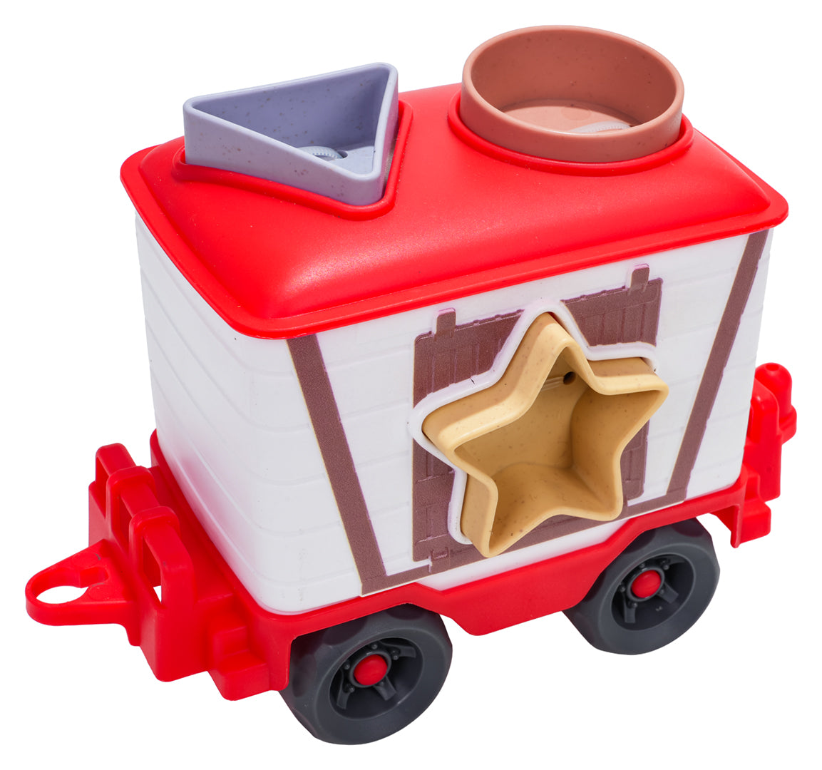 Rotaļu vilciena vagons ar zvaigznes formas šķirošanas atveri un ieliktņiem