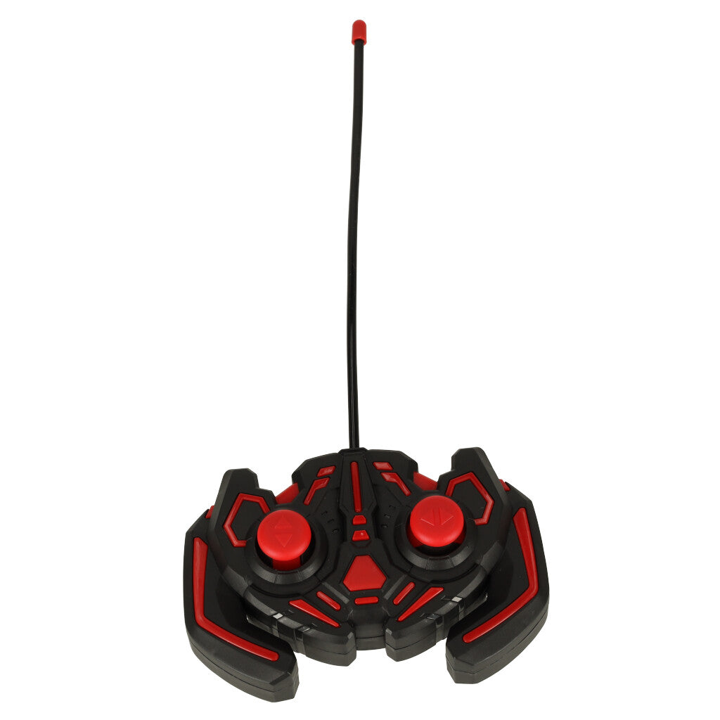 “Melns un sarkans tālvadības pults ar garu antenu un diviem vadības kloķiem.”
