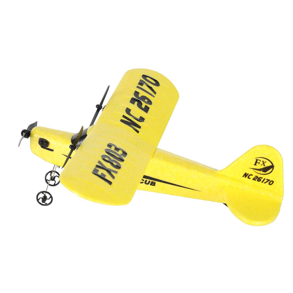 Tālvadības lidmašīna Piper J3 Cub dzeltenā krāsā skatā no augšpuses sāna