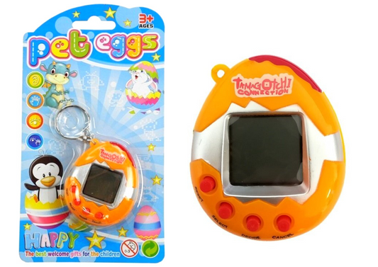 Oranžs elektroniskais mājdzīvnieks tamagotchi ola ar ekrānu un atslēgu piekariņu