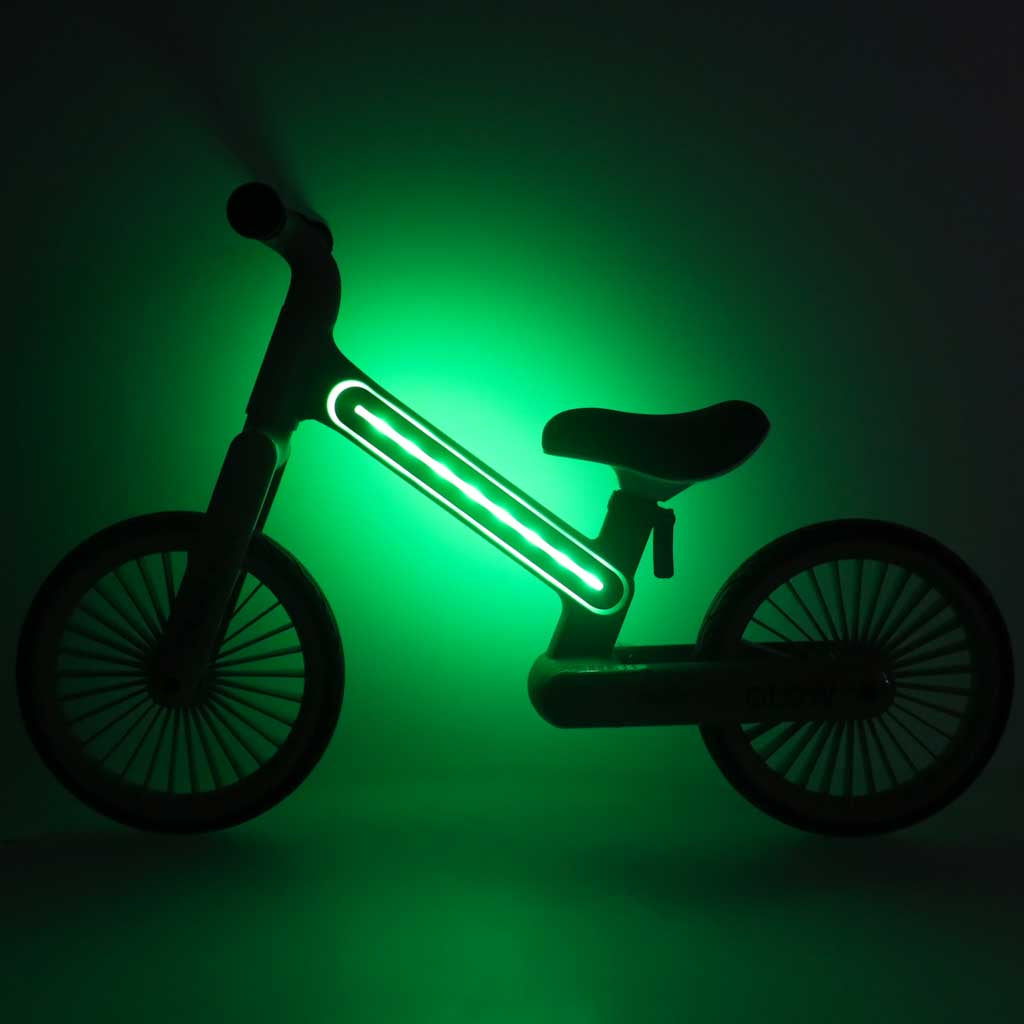 Trike Fix Glow līdzsvara velosipēds ar zaļu LED apgaismojumu tumsā
