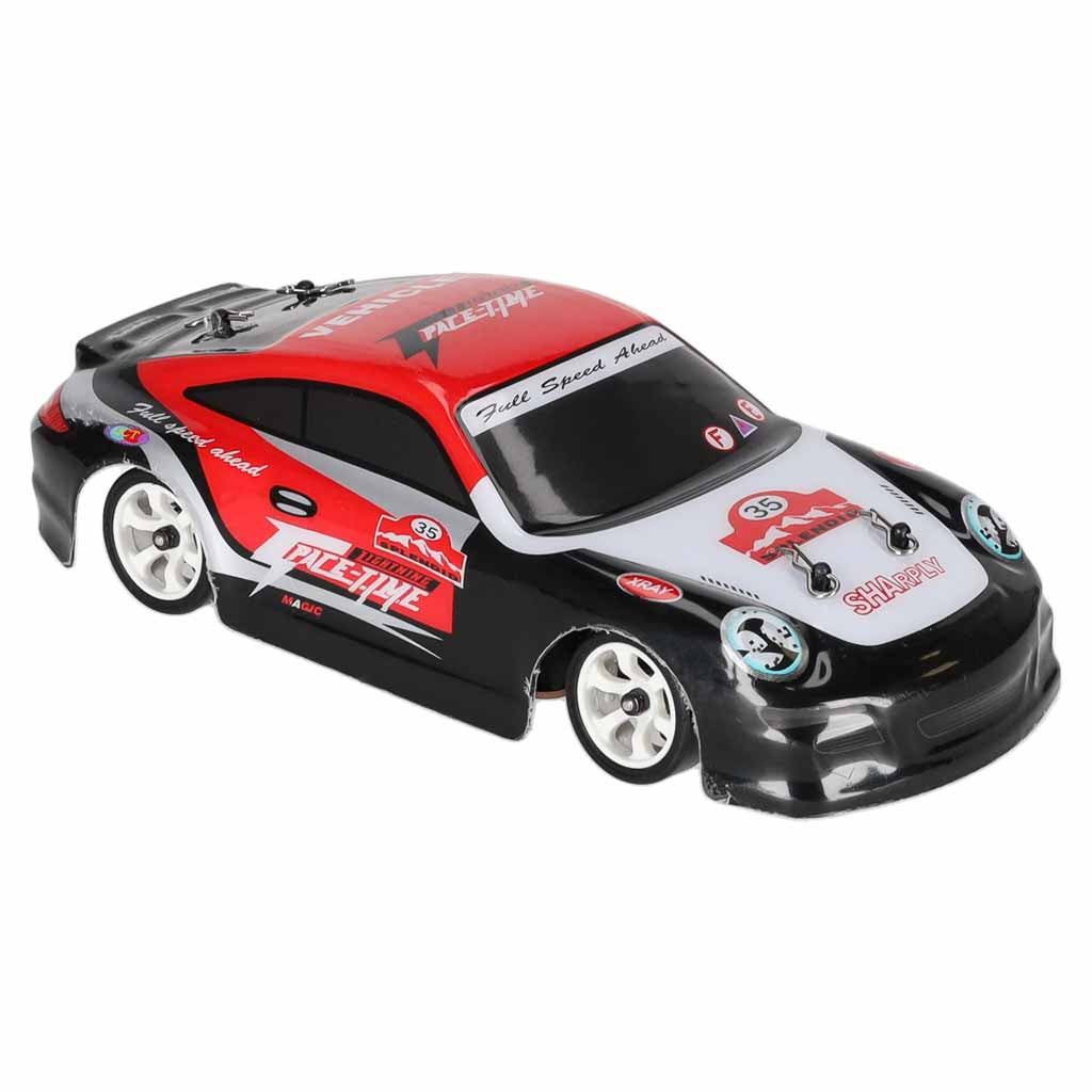 WLtoys K969 1:28 4WD drifta RC auto priekšskats sarkanā, baltā un melnā krāsā